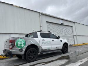 C & R All Spark Electrical vehicle out front of a shed in Adelaide