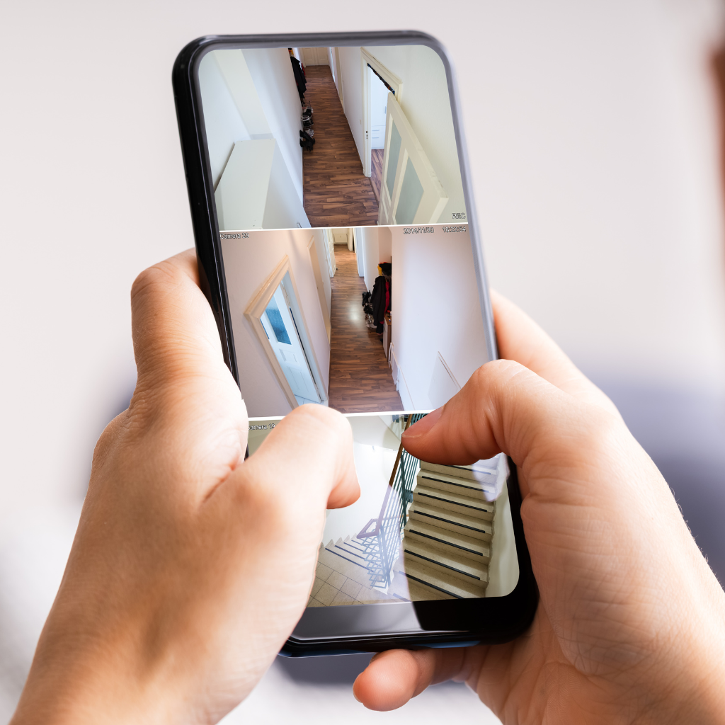 homeowner viewing 3 feeds from their home security cameras on a mobile device