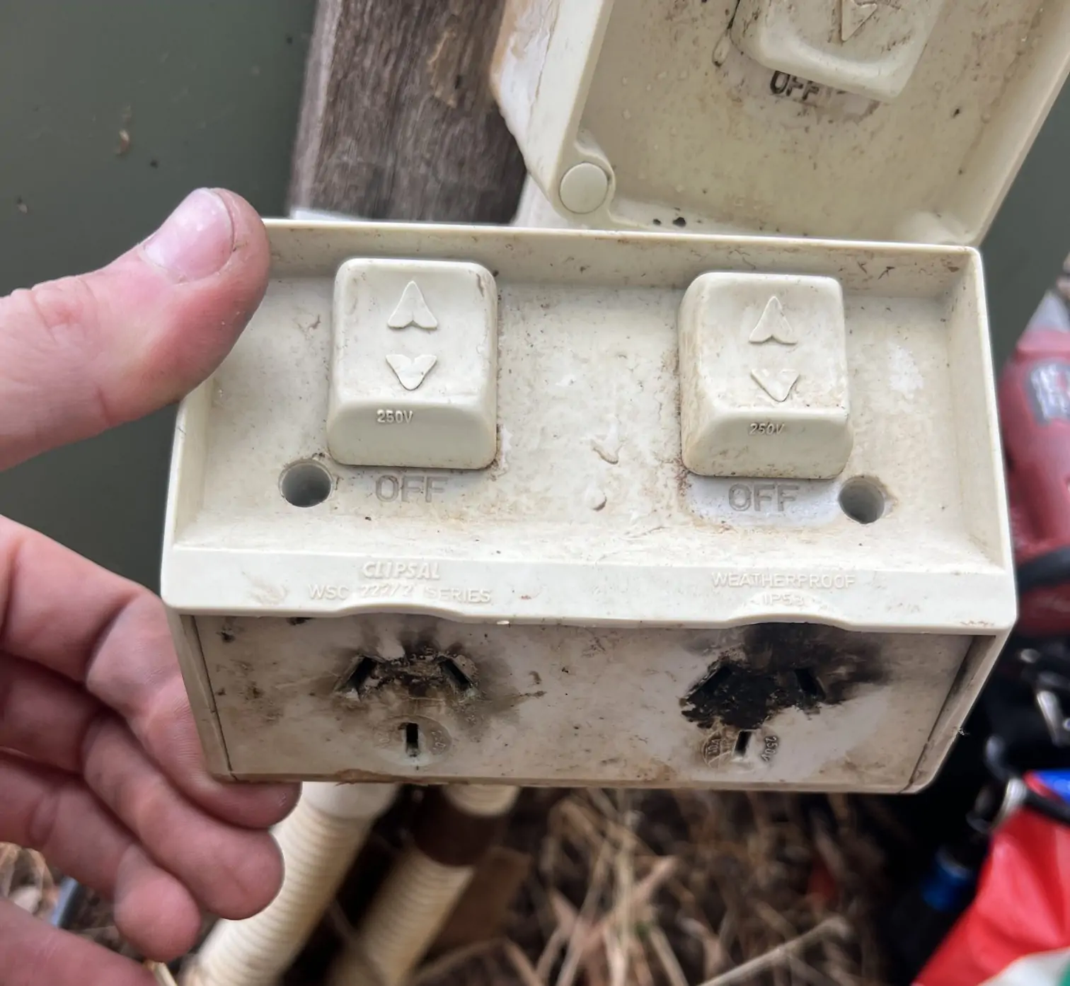 power outlet with burn marks